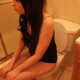 An absolutely beautiful brunette girl takes a shit while sitting on a toilet. Plops are clearly heard. There are also peeing sounds and lots of grunting and sighing. She wipes her ass at the end and inspects her own dirty toilet paper.